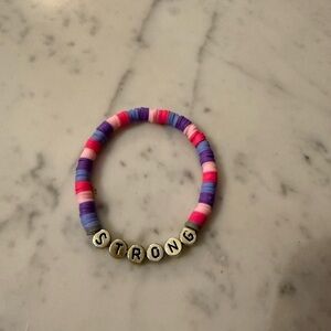 Colorful Beaded Bracelet with 'Strong' Letters